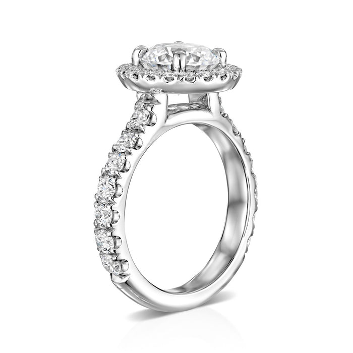 "IJS" Solomon Set 3/4 way engagement ring with a cathedral style Round halo and 2 carat round center. Collection VS diamonds 1.08 ctw
