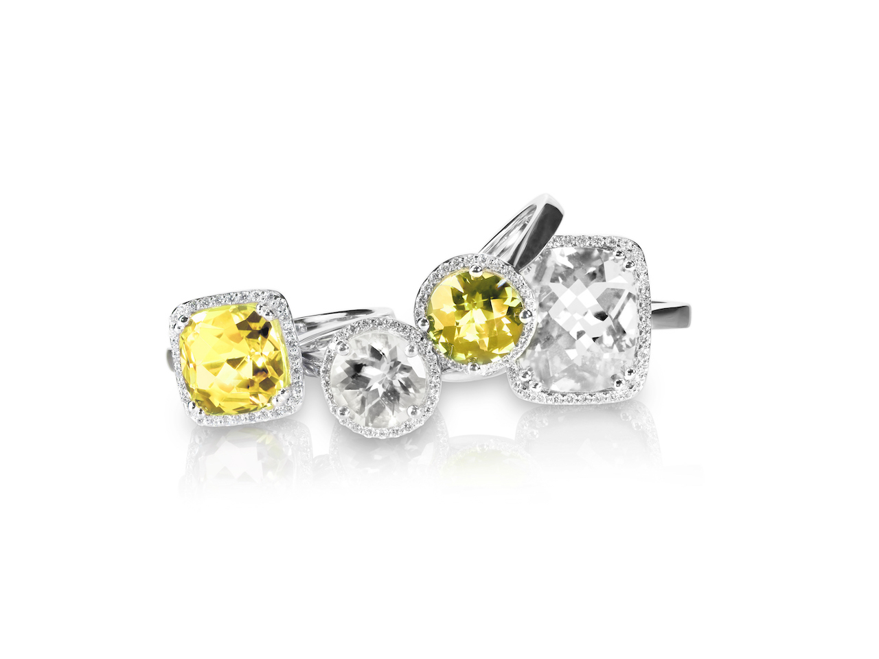 set of yellow and white diamond rings