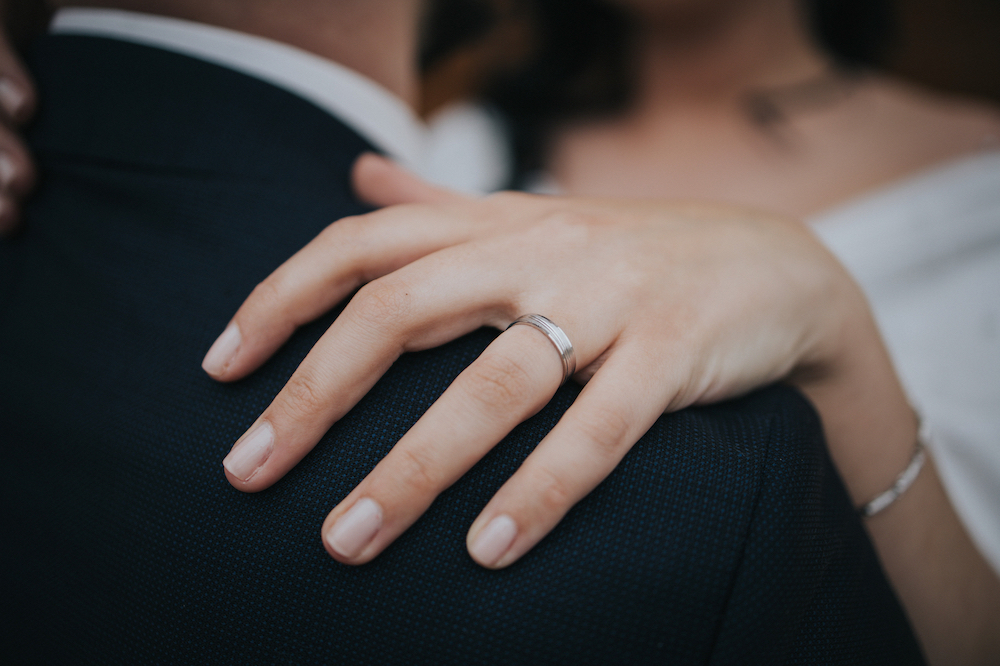 closeup shot of woman's wedding band